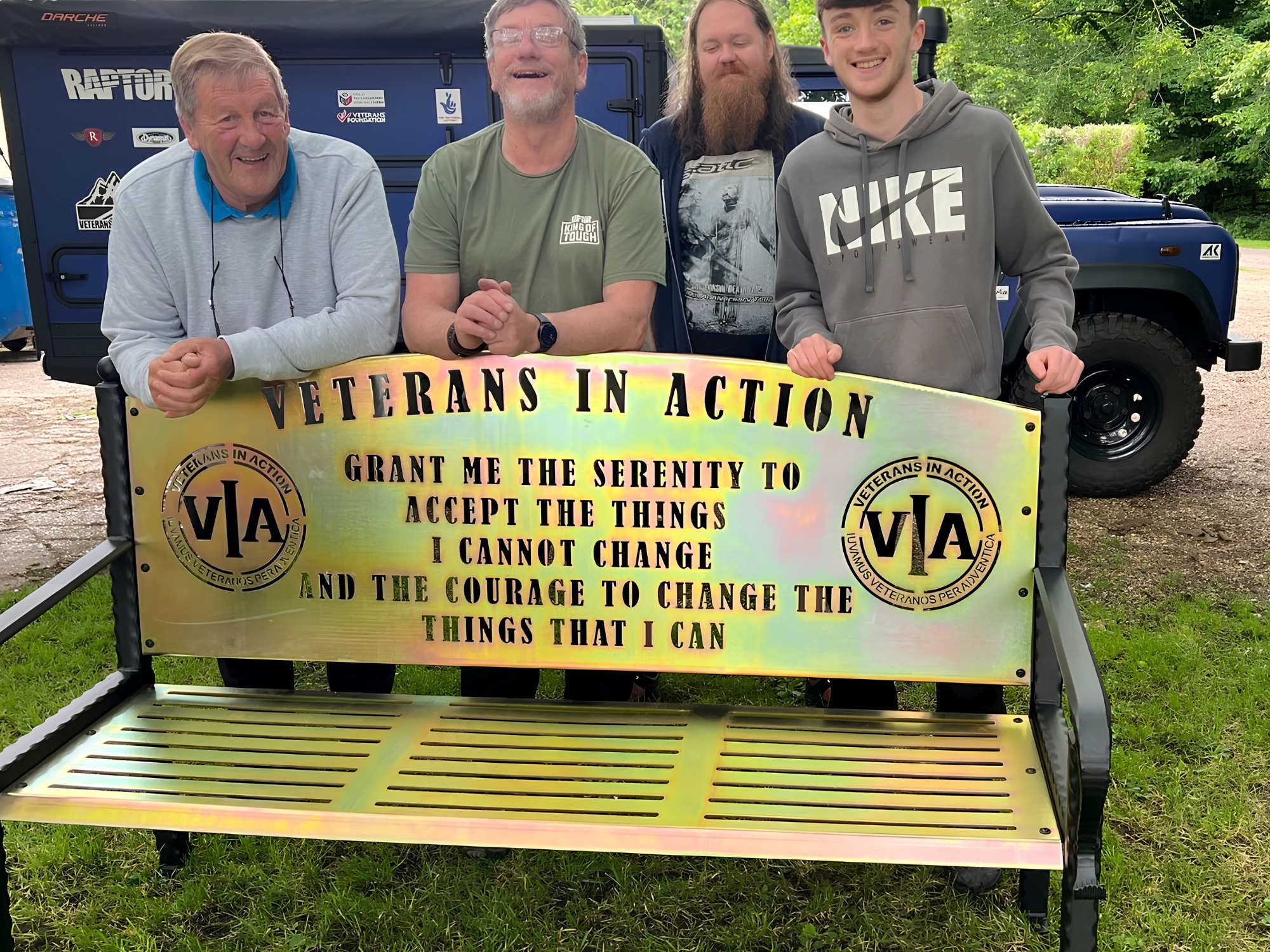 Veterans In Action steel memorial bench with laser‑cut Serenity Prayer design