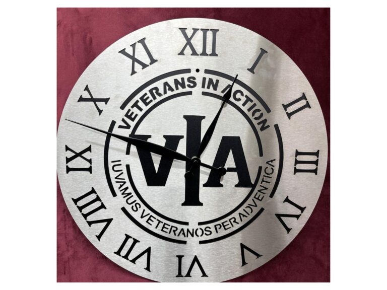Veterans In Action wall clock with VIA emblem and Roman numerals